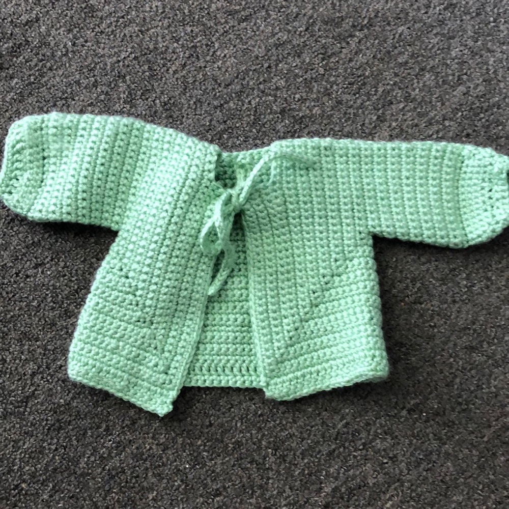 Mint green crochet baby sweater